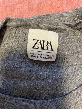 Jersey de punto gris con cremallera