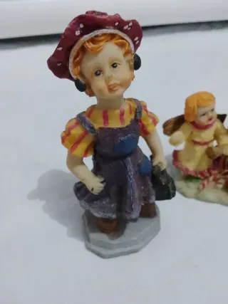 Figuras de porcelana niña y ángeles