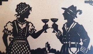 Quadro di carta ritagliata con coppia che brinda