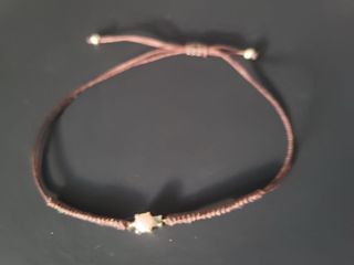 Pulsera Tous oro con gema