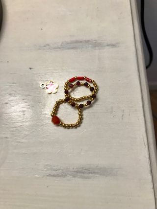 Anillos y colgante flor rosa