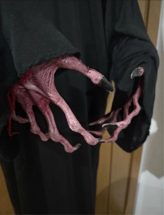 Scary hanging clown with light eyes