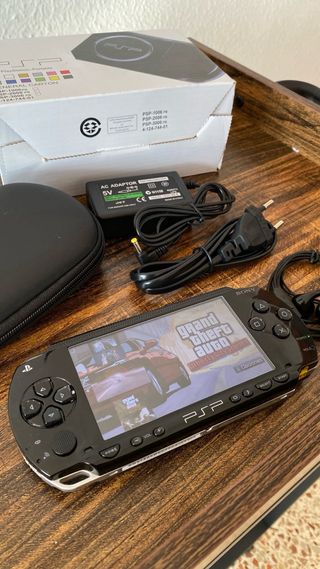 Sony PSP + memoria 128GB + accessori + scatola