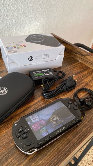 Sony PSP + memoria 128GB + accessori + scatola