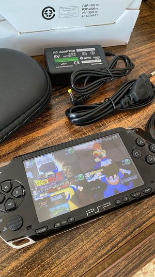 Sony PSP + memoria 128GB + accessori + scatola