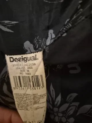 Piumino lungo Desigual nero con fantasia
