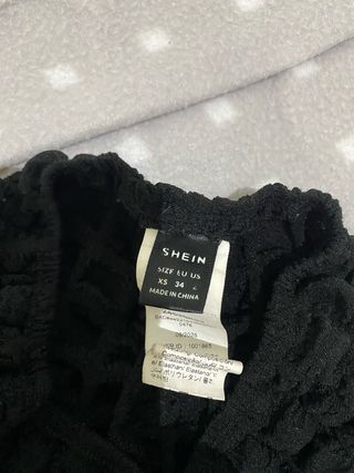 Pantalones negros texturizados