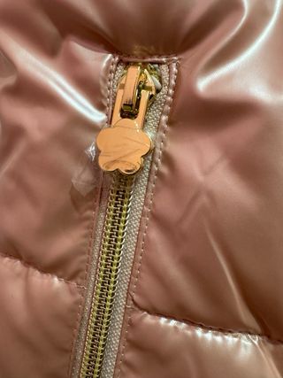 Chaleco infantil rosa dorado