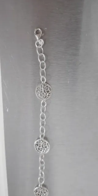 Pulsera de plata con diseño calado