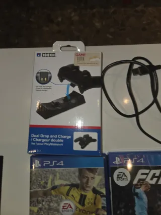 PS4 (PlayStation 4) Negra + 4 Juegos + Auriculares