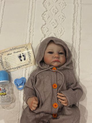 Bambola reborn con ciuccio e biberon