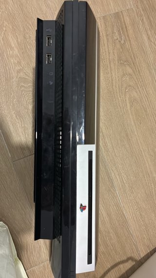 Playstation 3 + 3 juegos  + 4 mandos