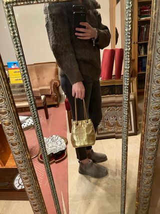 Bolso de fiesta dorado marca Gloria Orti