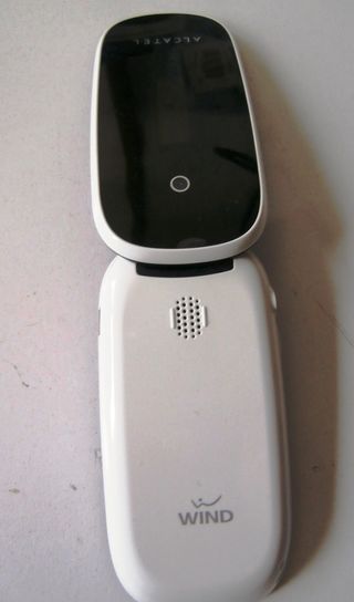 TELEFONO ALCATEL WIND ONE TOUCH 665 CON TAPA