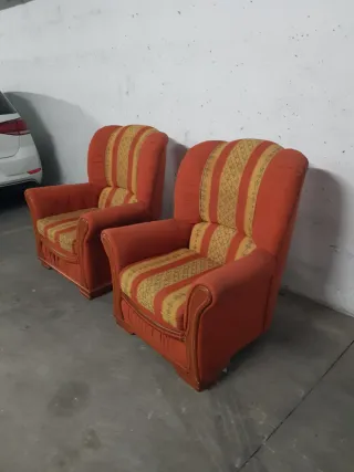2 sillones naranjas o sofa de una plaza