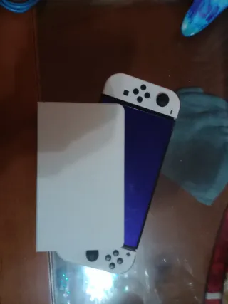 Nintendo Switch OLED + Controller Pikachu + FIFA 24