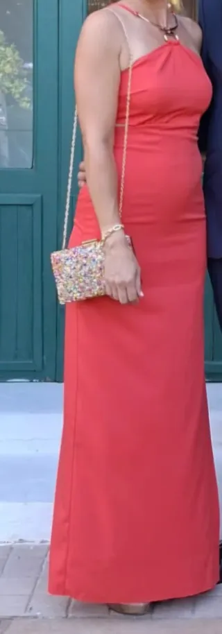 Vestido de fiesta largo naranja con escote halter