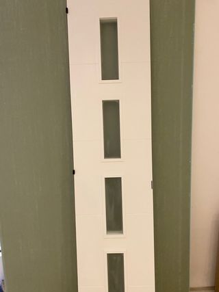 Puerta maciza interior blanca doble con cristal