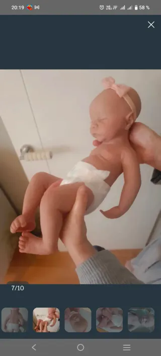 Bebé de silicona con chupete