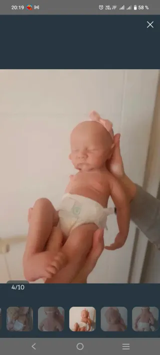 Bebé de silicona con chupete