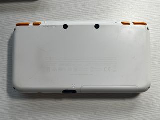 Nintendo 2DS XL Arancione e Bianca + Giochi