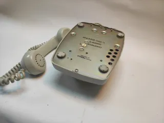 Teléfono antiguo gris