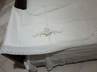 Copriletto e lenzuola matrimoniali