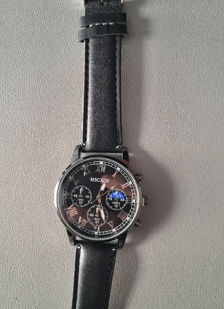 Reloj MSCXDK Negro y Plateado