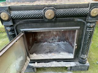 Chimenea de empotrar metal y piedra