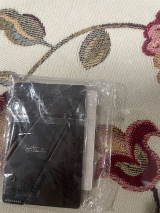 Tarjeta con navaja incorporada