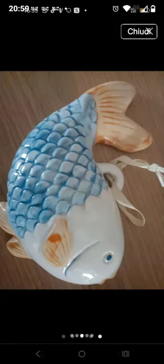 Decorazioni a forma di pesce e conchiglia