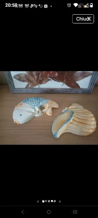 Decorazioni a forma di pesce e conchiglia