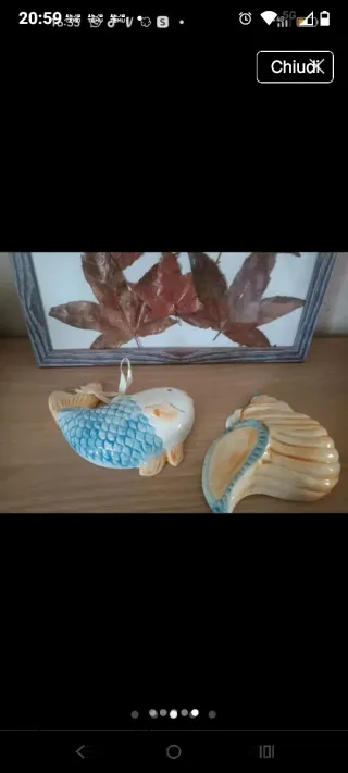 Decorazioni a forma di pesce e conchiglia