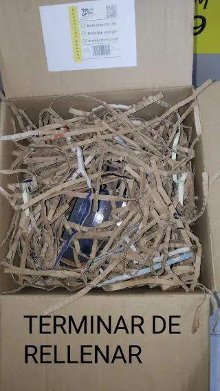 Relleno de cartón triturado para embalaje