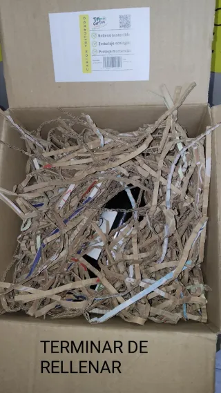 Relleno de cartón triturado para embalaje