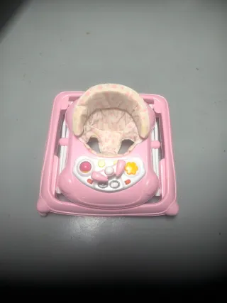 Andador bebé rosa con centro de actividades