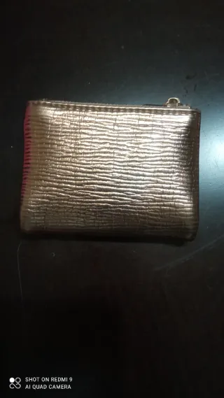 Monedero Sfera Dorado