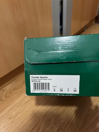 Zapatillas Puma Thunder Spectra grises y naranjas