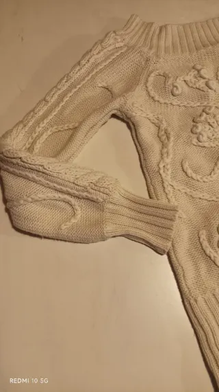 Camisola de malha creme com relevos