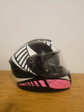 Casco de moto integral rosa y blanco