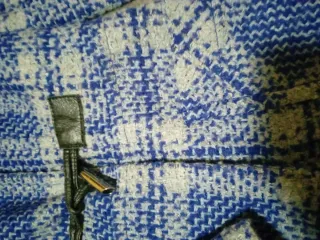 2 abrigos de Benetton y Stradivarius