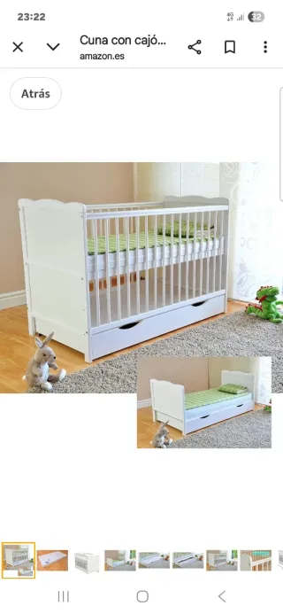 Cuna de bebé blanca con cajón