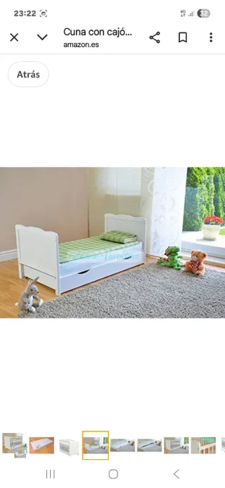 Cuna de bebé blanca con cajón