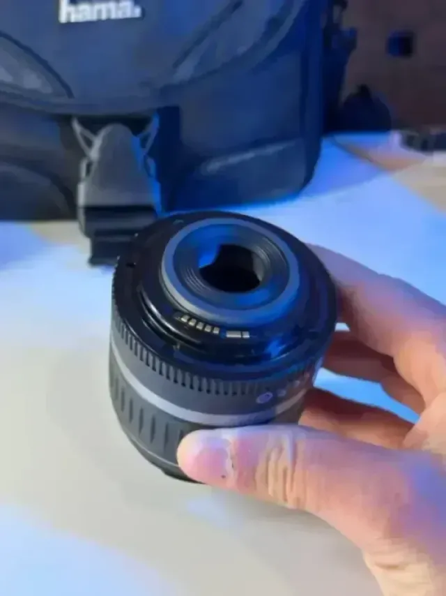 IMPECABLE Canon EOS 1000D