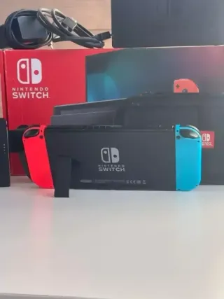 IMPECABLE Nintendo switch v2 con accesorios