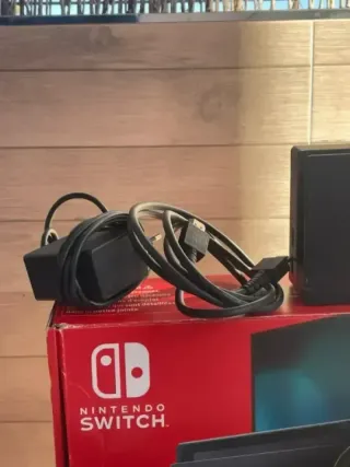 IMPECABLE Nintendo switch v2 con accesorios