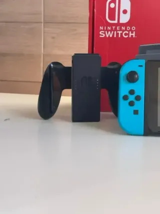 IMPECABLE Nintendo switch v2 con accesorios