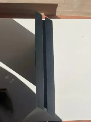 COMO NUEVA Ps4 fat con mando