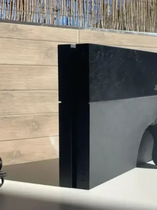 COMO NUEVA Ps4 fat con mando