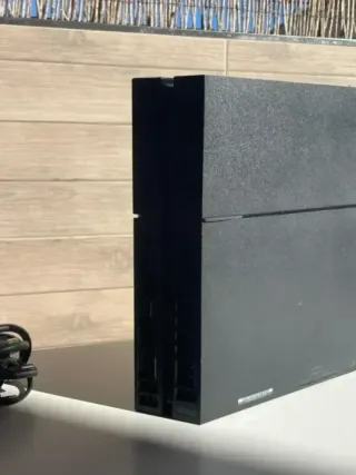 COMO NUEVA Ps4 fat con mando